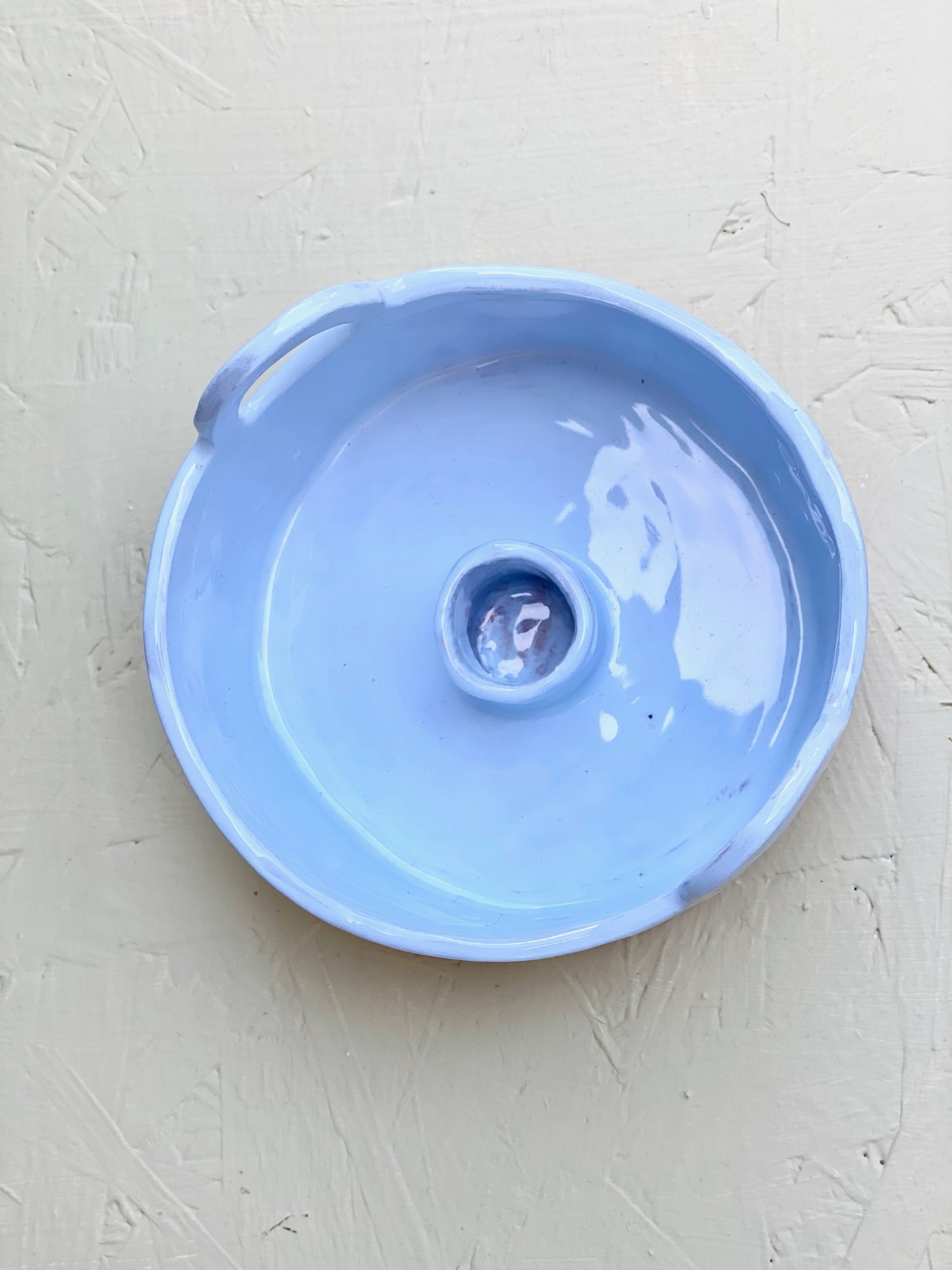 Ljusstake med handtag. Pastellblå